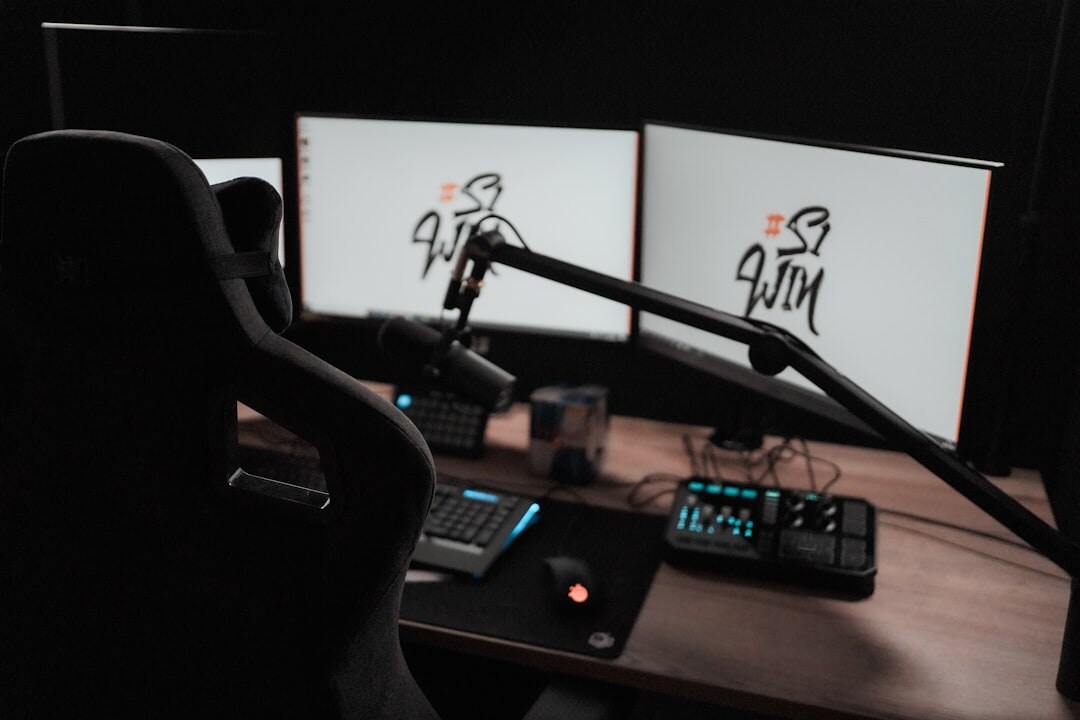 Broadcast control room with multiple monitors and production desk